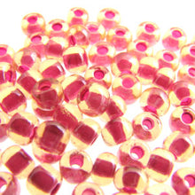 Load image into Gallery viewer, Czech Seedbeads 6/0 Topaz Red Lined Qty:23g