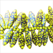 Load image into Gallery viewer, Czech Daggers 5X16mm Opaque Yellow Lasered Flowers Qty:25 Strung
