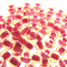 Load image into Gallery viewer, Czech Seedbeads 6/0 Topaz Red Lined Qty:23g
