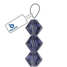 Load image into Gallery viewer, Preciosa 4mm Bicones Tanzanite Qty:31 strung
